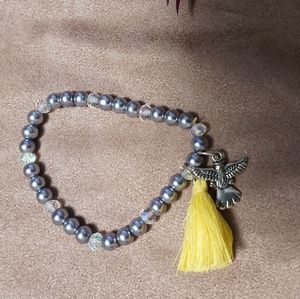 Bead bracelet with charm